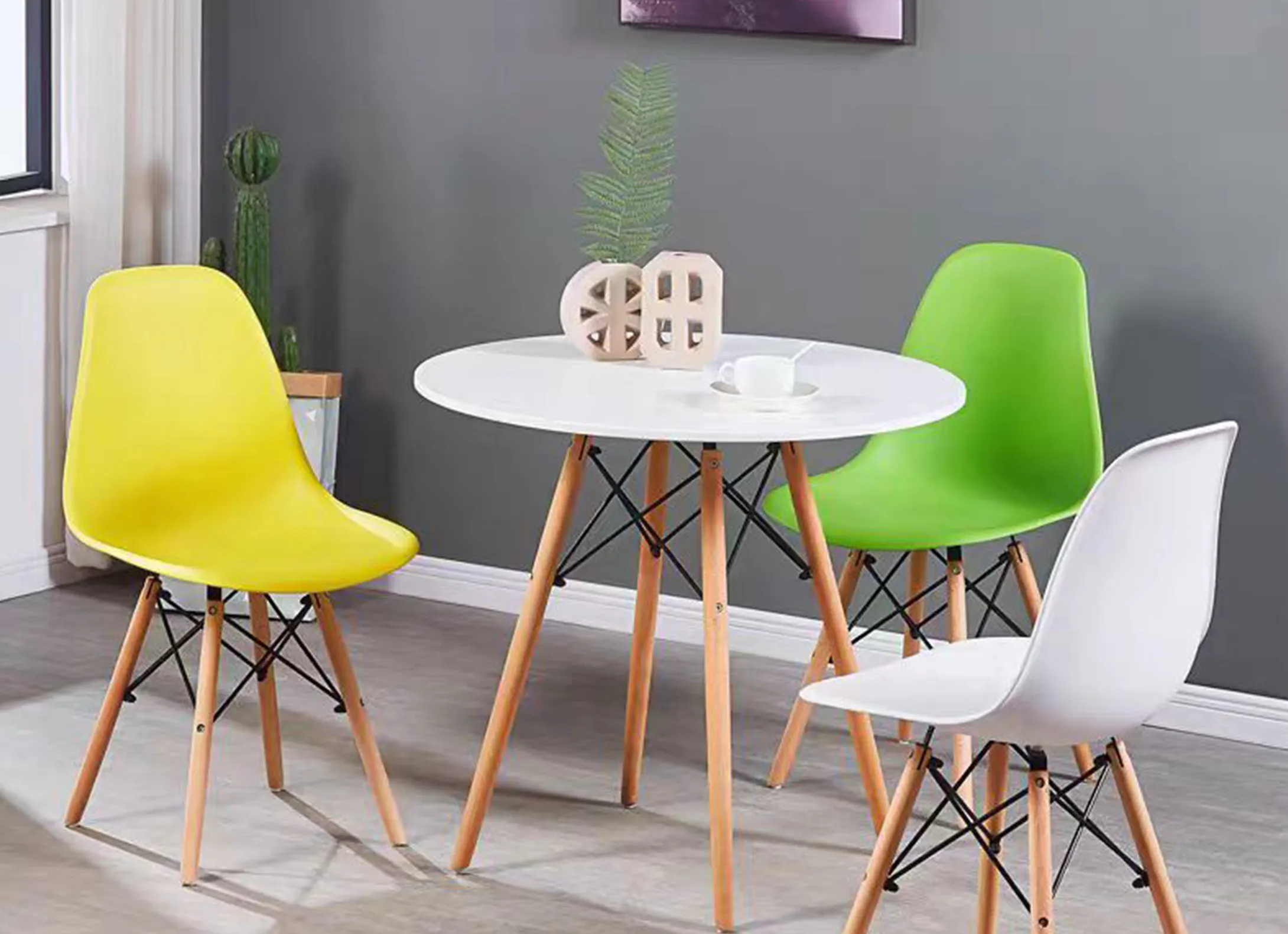 Colorful modern chairs stacked together in a stylish room